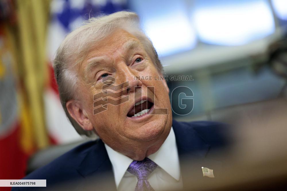 US President Donald J. Trump delivers remarks during a signing ceremony in the Oval Office