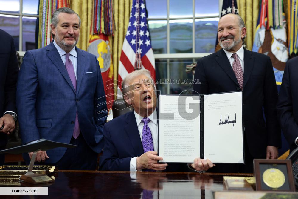 US President Donald J. Trump delivers remarks during a signing ceremony in the Oval Office