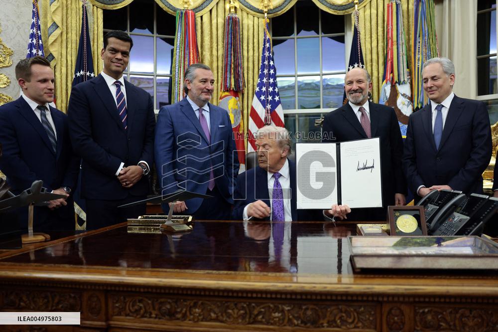 US President Donald J. Trump delivers remarks during a signing ceremony in the Oval Office