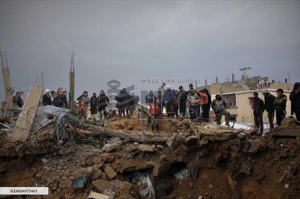Search and Rescue Efforts Continue After Building Collapse - Gaza