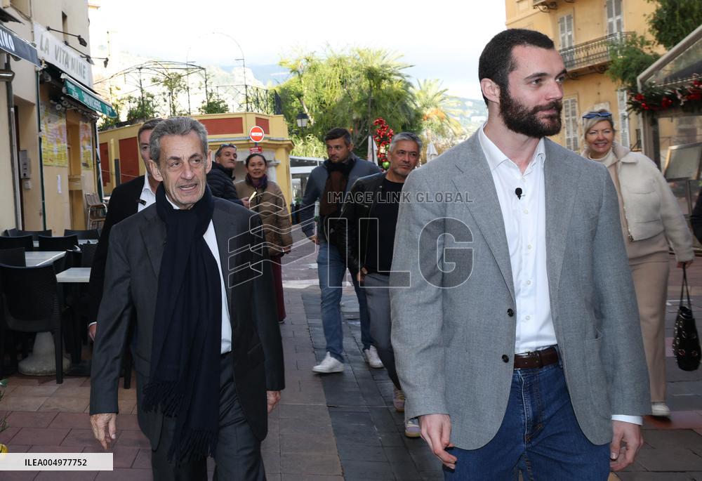 Nicolas Sarkozy And Son Leave Restaurant To Attend Book Signing - France