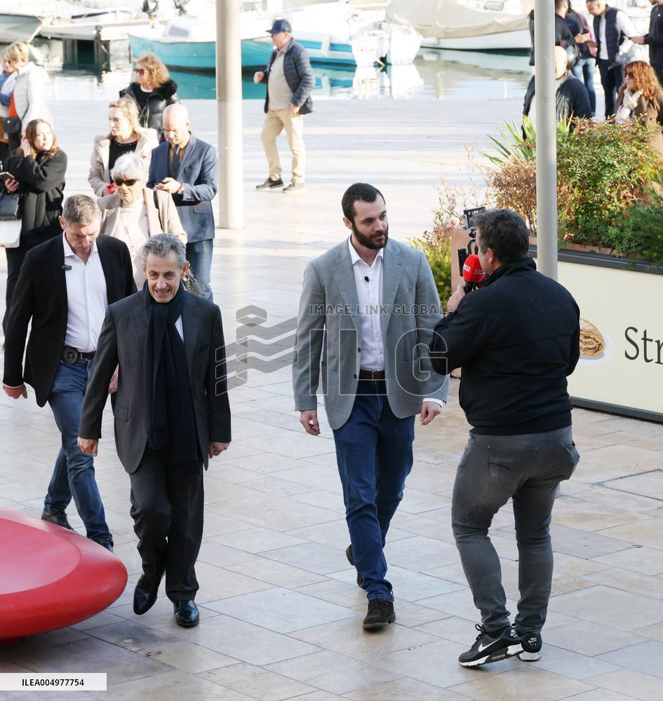 Nicolas Sarkozy And Son Leave Restaurant To Attend Book Signing - France