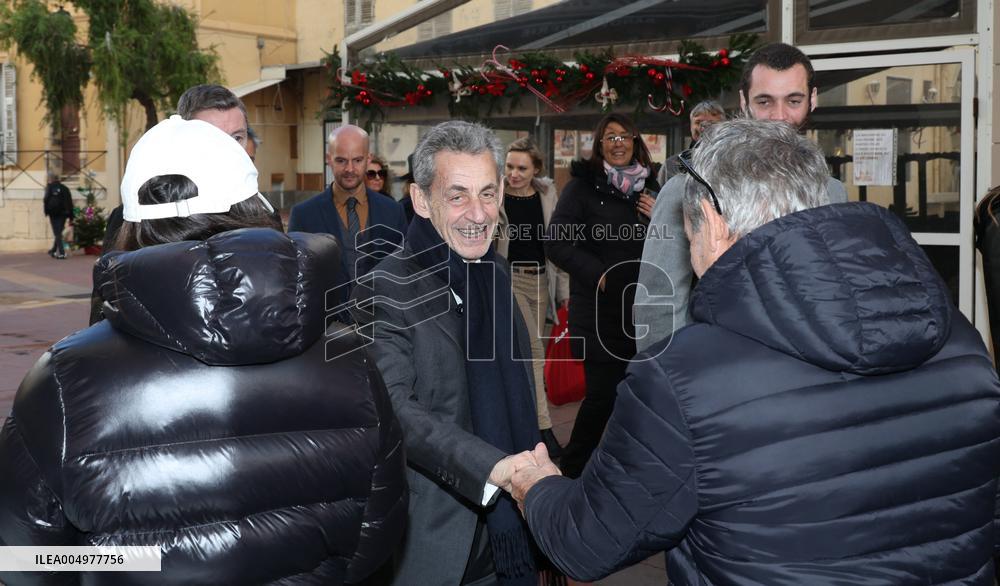 Nicolas Sarkozy And Son Leave Restaurant To Attend Book Signing - France