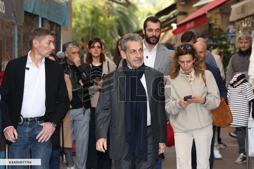Nicolas Sarkozy And Son Leave Restaurant To Attend Book Signing - France