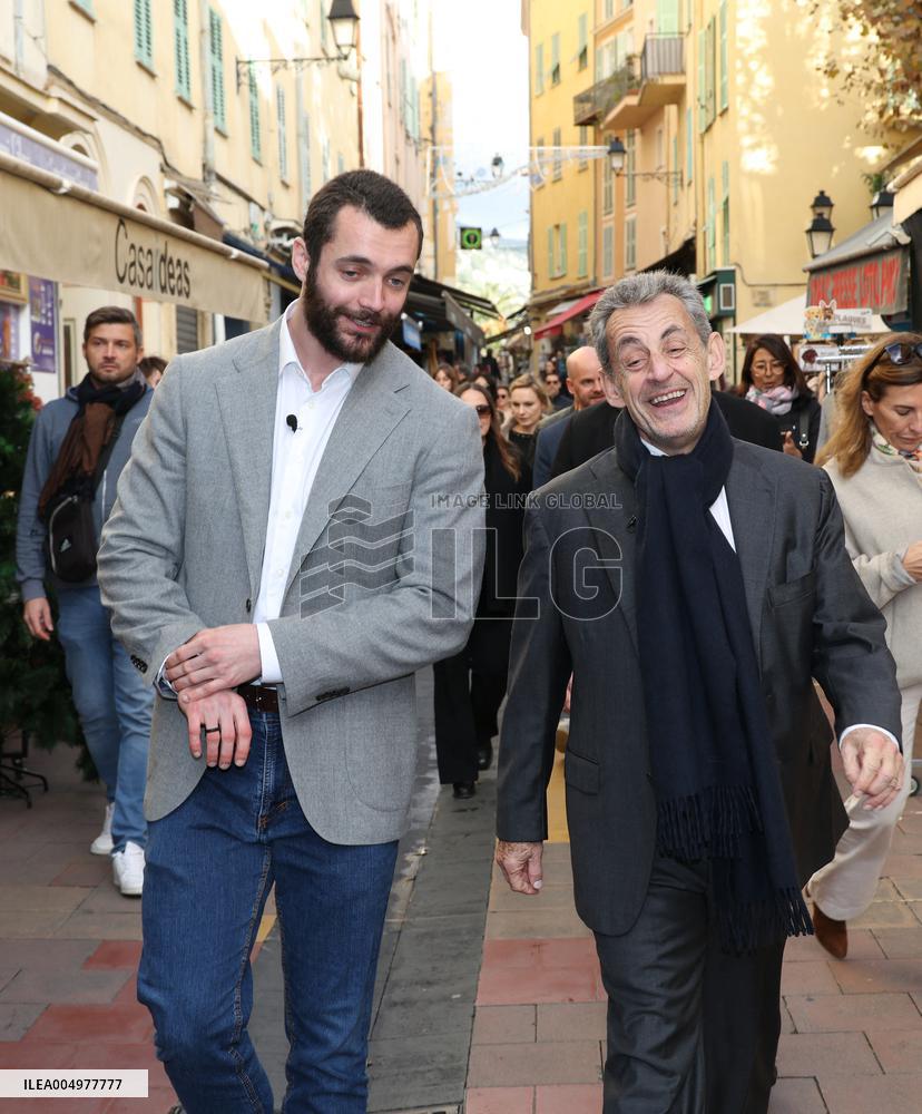 Nicolas Sarkozy And Son Leave Restaurant To Attend Book Signing - France