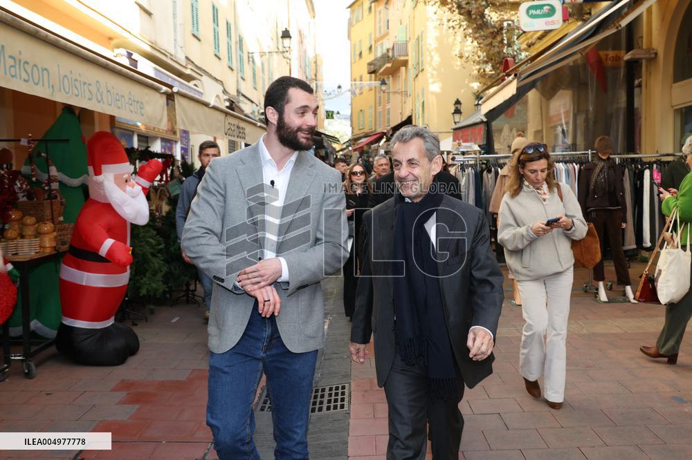 Nicolas Sarkozy And Son Leave Restaurant To Attend Book Signing - France