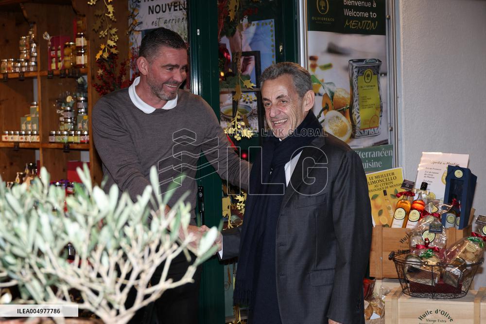 Nicolas Sarkozy And Son Leave Restaurant To Attend Book Signing - France