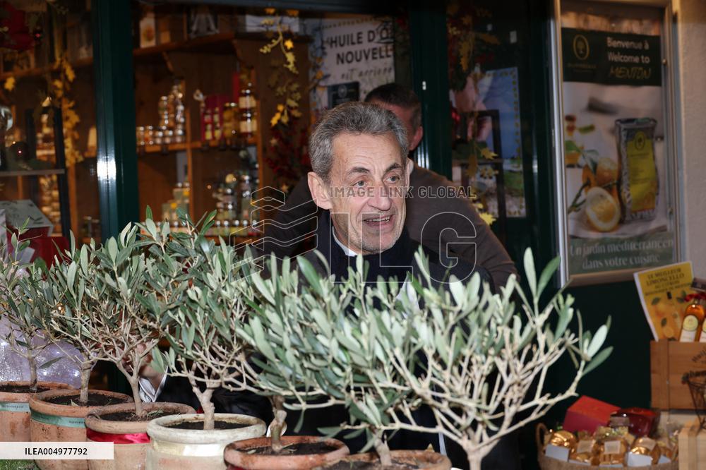 Nicolas Sarkozy And Son Leave Restaurant To Attend Book Signing - France