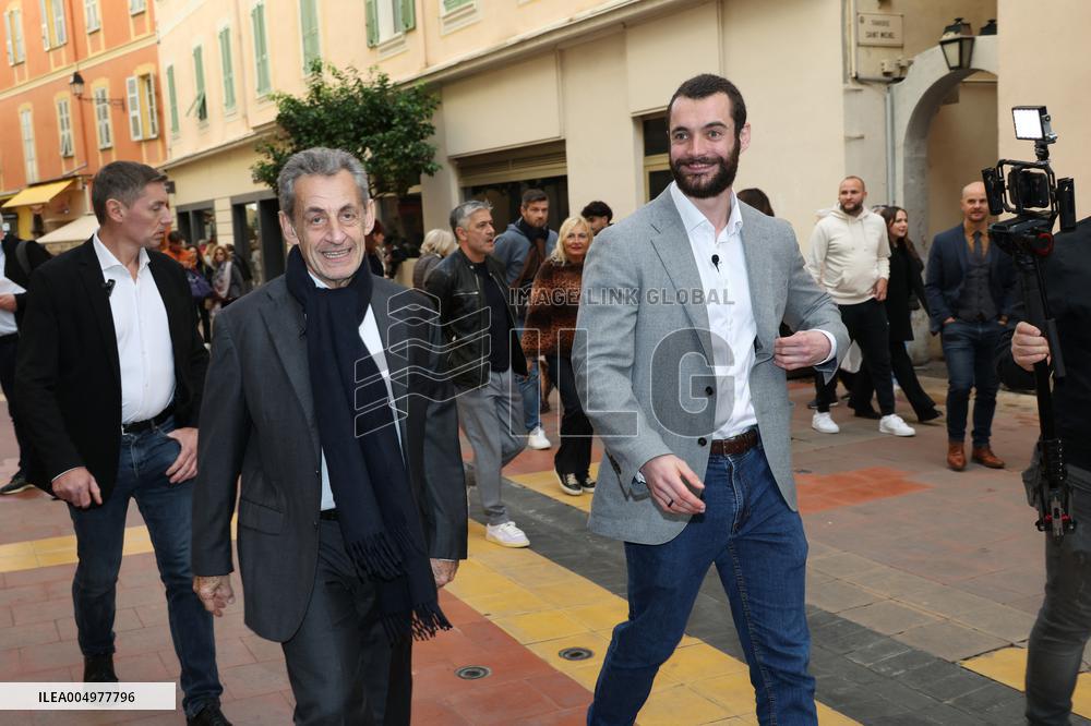 Nicolas Sarkozy And Son Leave Restaurant To Attend Book Signing - France