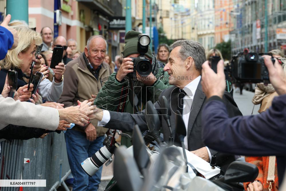 Nicolas Sarkozy And Son Leave Restaurant To Attend Book Signing - France