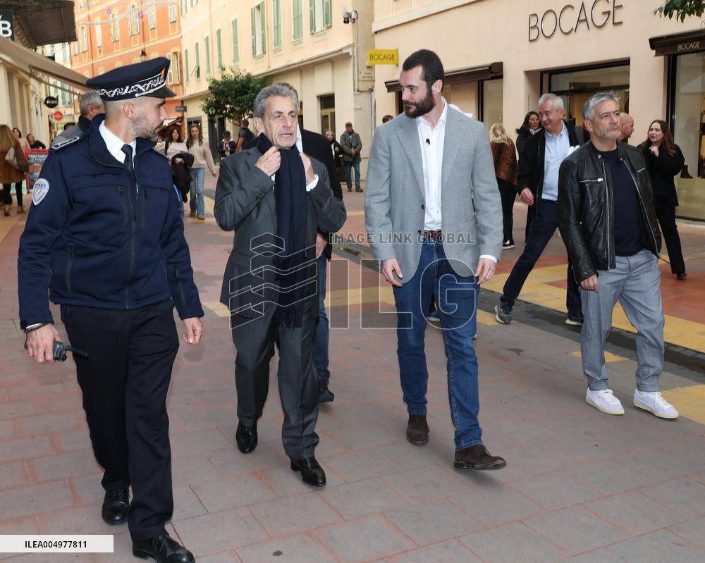 Nicolas Sarkozy And Son Leave Restaurant To Attend Book Signing - France