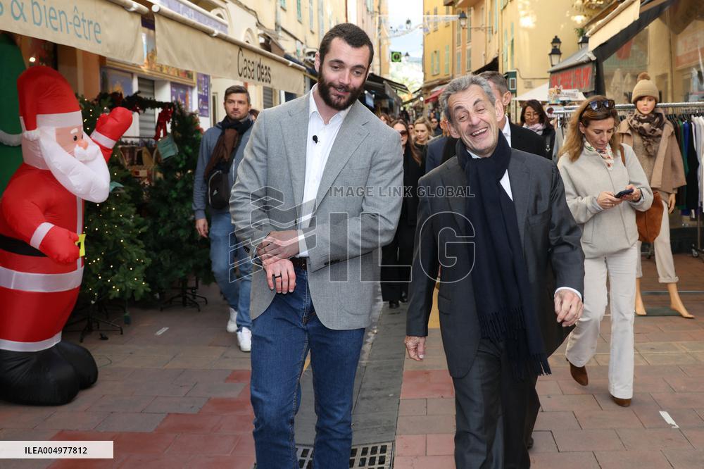 Nicolas Sarkozy And Son Leave Restaurant To Attend Book Signing - France