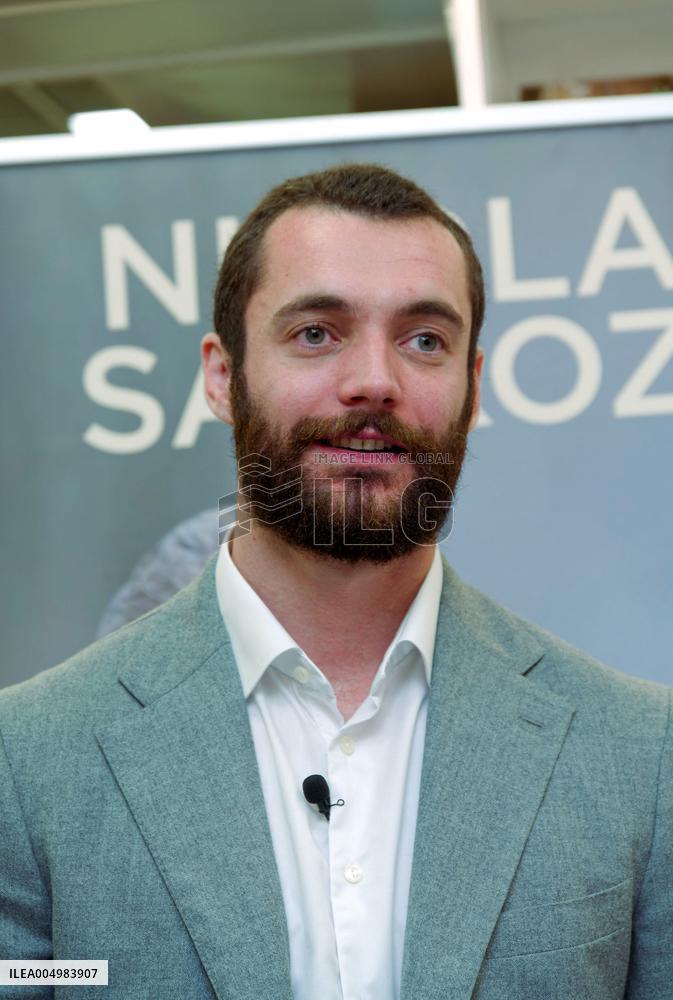 Nicolas and Louis Sarkozy At Public Book Signing - France