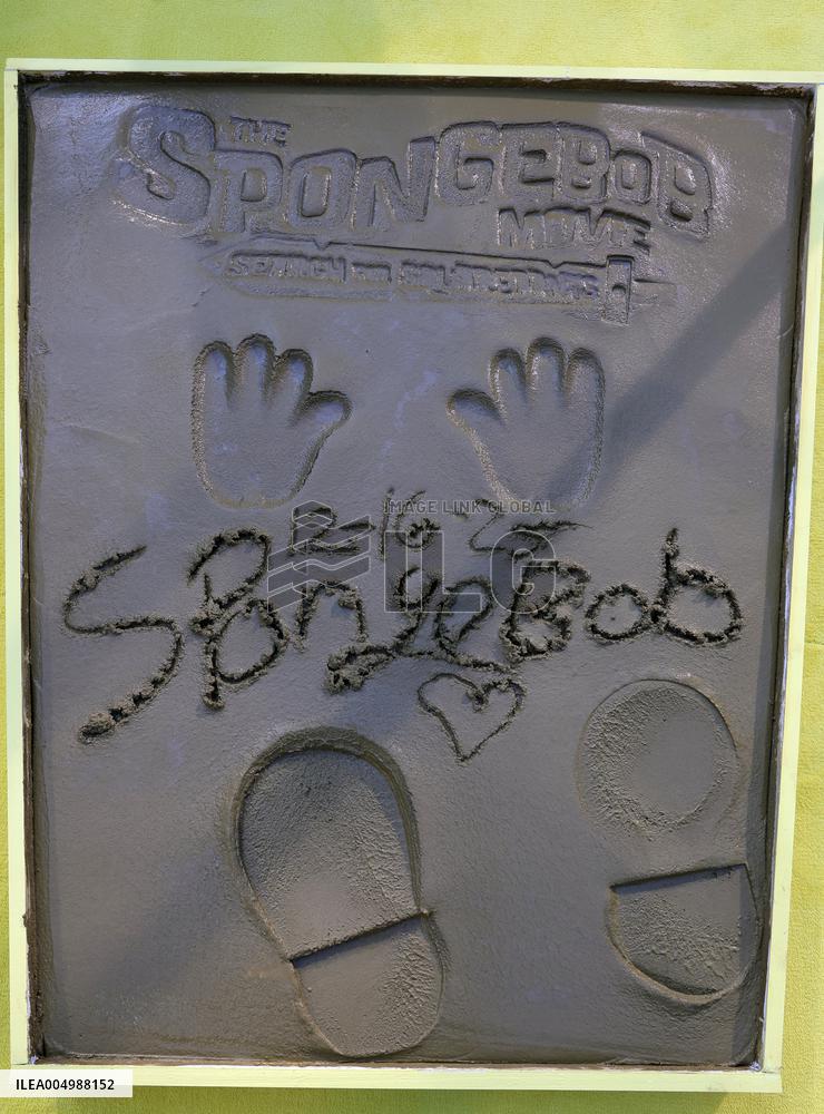 Spongebob Squarepants Places His Hand And Footprints In Cement - LA