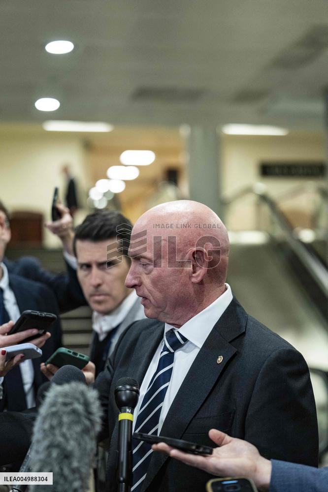 Mark Kelly offers remarks after he came out of a classified briefing