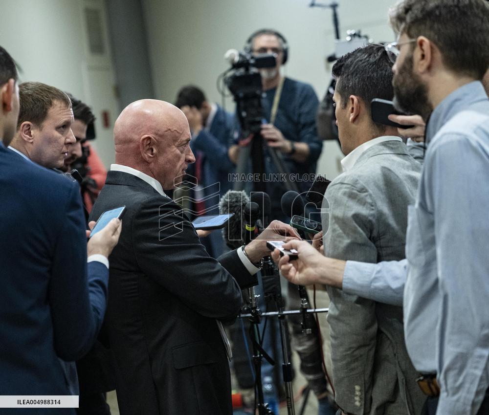 Mark Kelly offers remarks after he came out of a classified briefing