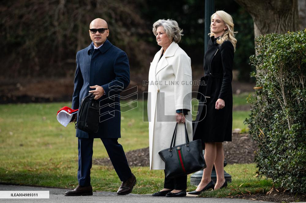 Trump Aides Walk On White House South Lawn - DC