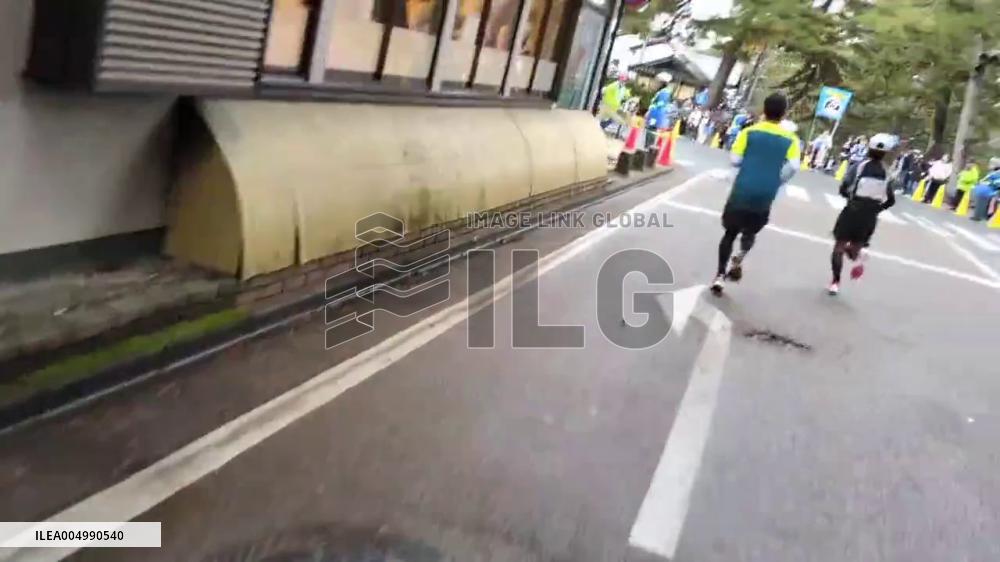 Japan: Deer Casually Cross Nara Marathon Course, Delighting Spectators