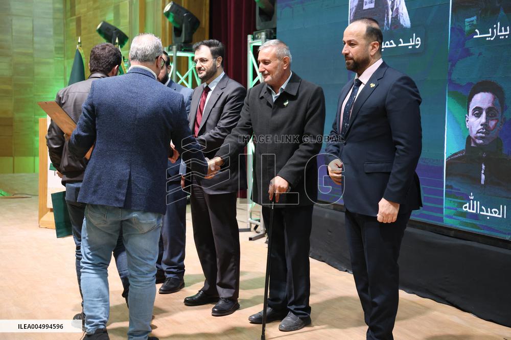 Syrian Government Officials Honor Families of Victims