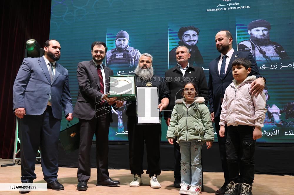 Syrian Government Officials Honor Families of Victims