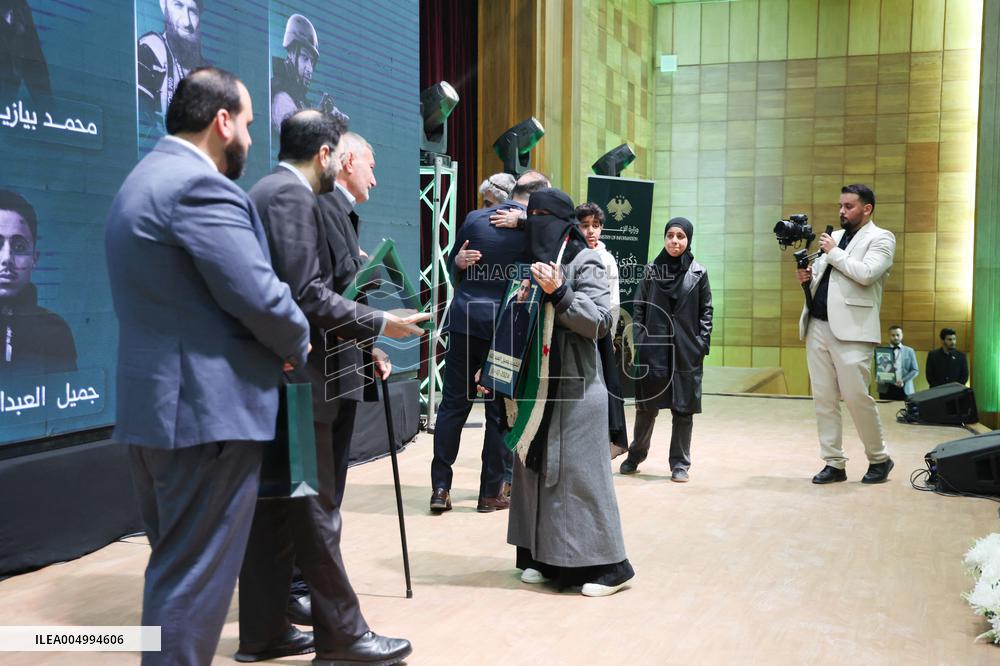 Syrian Government Officials Honor Families of Victims