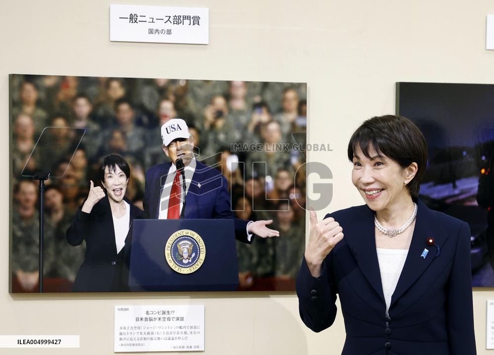 Japan PM Takaichi visits news photo exhibition