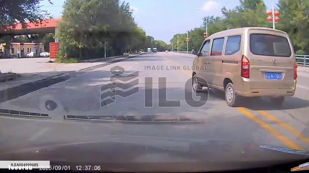 China: Vehicle Spins 360 Degrees Into Oncoming Lane After Aggressive Cut-Off