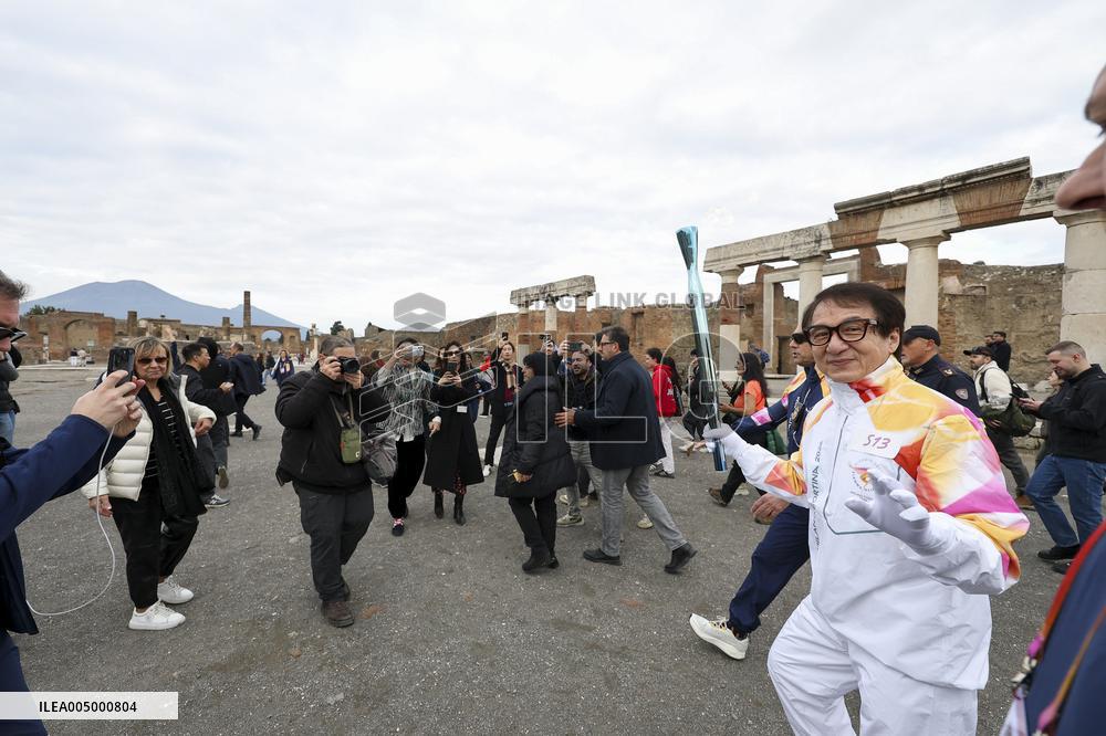 Jackie Chan Holds the Milan Cortina 2026 Olympic Flame - Pompeii