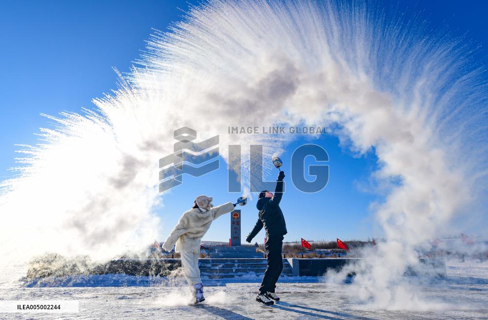 Splashing Water into Ice