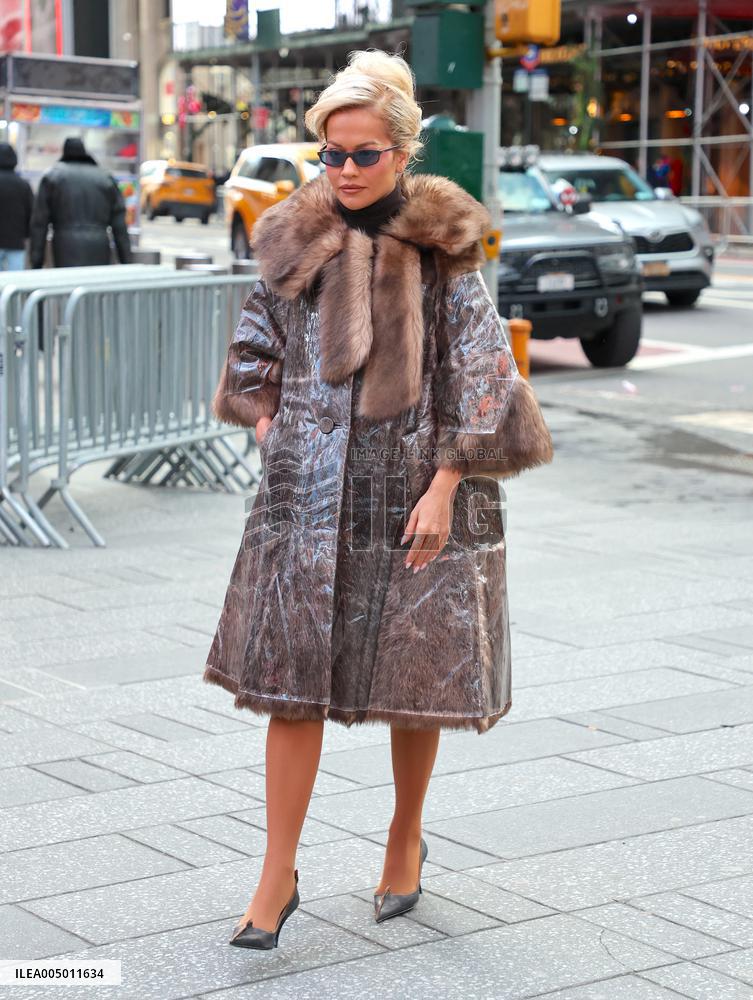 Rita Ora and Ryan Seacrest out in Times Square