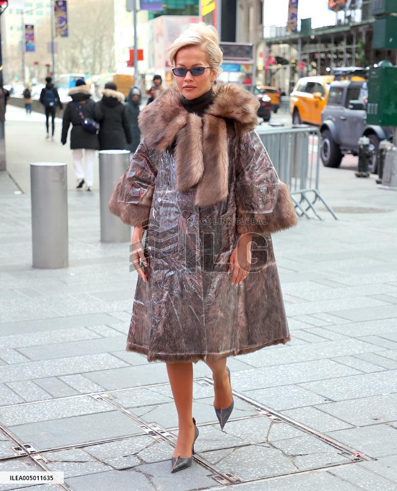 Rita Ora and Ryan Seacrest out in Times Square