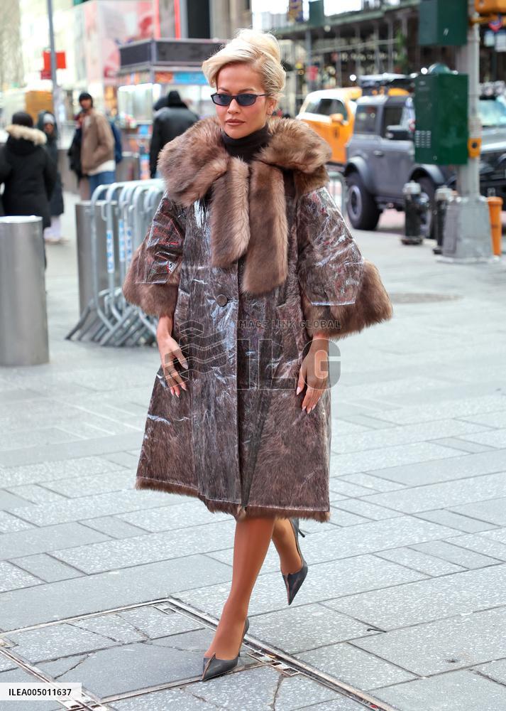 Rita Ora and Ryan Seacrest out in Times Square