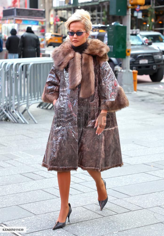 Rita Ora and Ryan Seacrest out in Times Square
