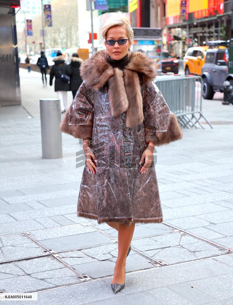 Rita Ora and Ryan Seacrest out in Times Square