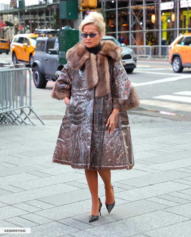 Rita Ora and Ryan Seacrest out in Times Square