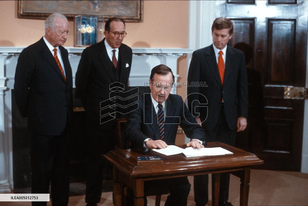 US President George HW Bush signs a Executive Order on Ethics Reform