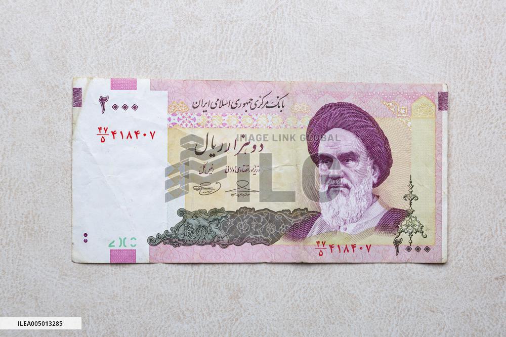 Illustration - Iranian Rial vs US Dollar A Currency in Crisis