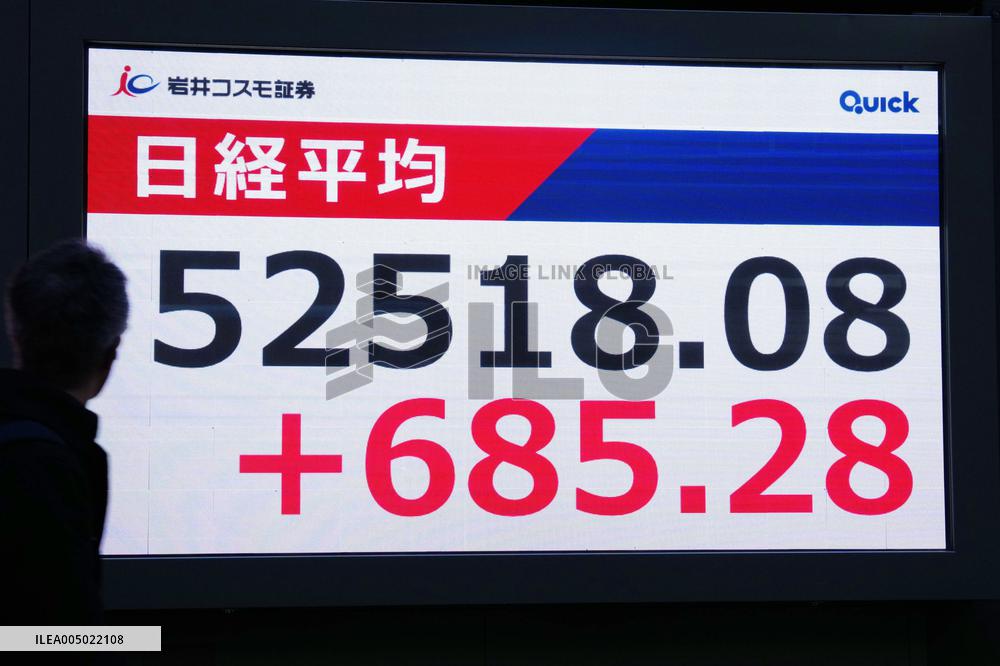 Nikkei stock index closes at record high