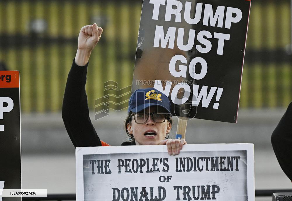 Protesters gather to denounce raids conducted by the US Immigration and Customs Enforcement (ICE)