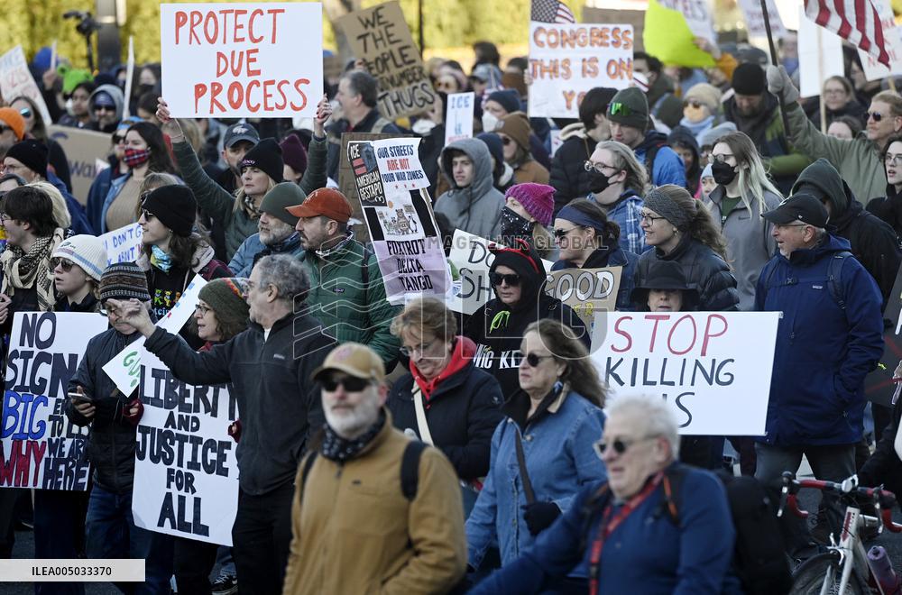 Anti-ICE protesters gather outside the US Immigration and Customs Enforcement (ICE)  headquarters