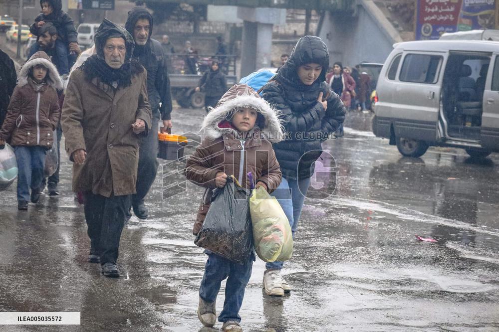 Civilians Flee Aleppo Amid Kurdish-Government Clashes