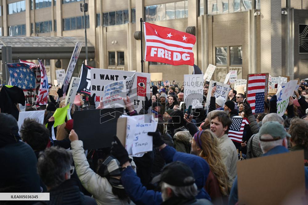 Anti-ICE protesters gather outside the US Immigration and Customs Enforcement (ICE)  headquarters