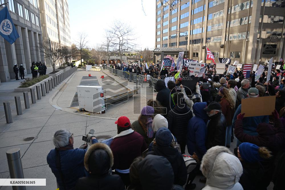 Anti-ICE protesters gather outside the US Immigration and Customs Enforcement (ICE)  headquarters