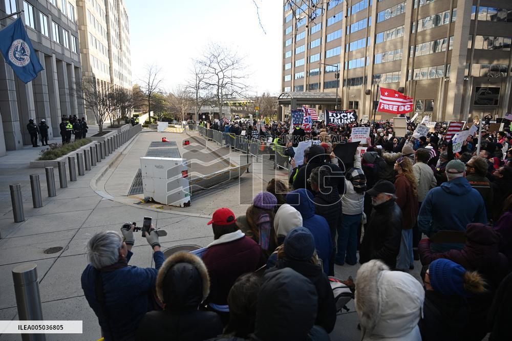 Anti-ICE protesters gather outside the US Immigration and Customs Enforcement (ICE)  headquarters