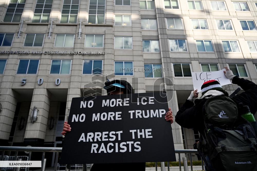 Anti-ICE protesters gather outside the US Immigration and Customs Enforcement (ICE)  headquarters
