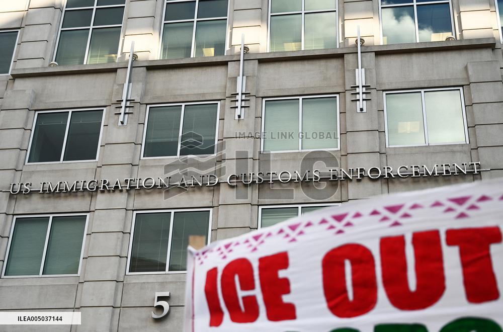 Anti-ICE protesters gather outside the US Immigration and Customs Enforcement (ICE)  headquarters