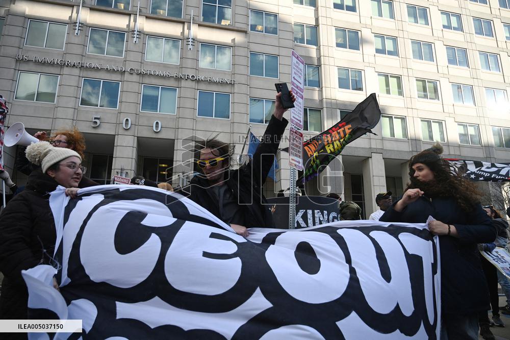 Anti-ICE protesters gather outside the US Immigration and Customs Enforcement (ICE)  headquarters
