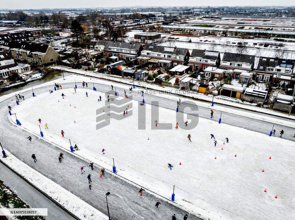 People Skate on Natural Ice Rink in Boskoop - Netherlands