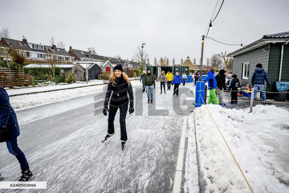 People Skate on Natural Ice Rink in Boskoop - Netherlands