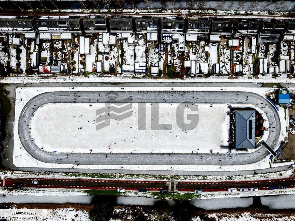 People Skate on Natural Ice Rink in Boskoop - Netherlands